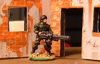 Plastic Trooper with metal heavy weapon arms - Walls are CoZo walls stripped from cardboard and applied to black foamcore