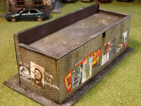 The back wall was attached upside-down and the wiring access hole was used as a vent.