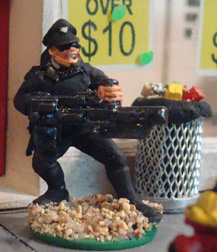 Basic figure:
0051 Cop. Auto shotgun 
Rearmed with:
SFP7a  Heavy Weapons