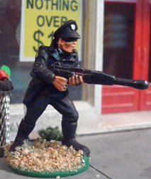Basic figure:
0050 Cop. SMG 
Rearmed with:
0326 Sentry Gun