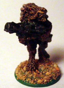 3244b Phagon Beastman with heavy flamer - advancin