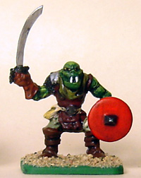 eM-4  plastic Orc

His left arm is repositioned outward and rotated forward: His right arm has not been moved. Any farther out than this, and his shield will interfere with other figures.